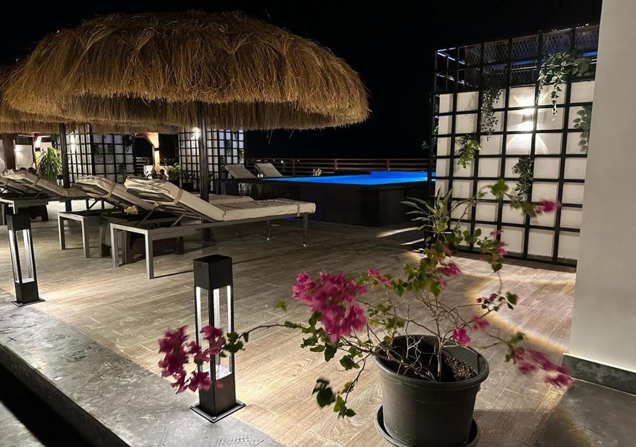 Sanctuary Sunlit Hurghada Haven With 4 Pools, Rooftop Sunsets & Gourmet Bites Steps Away מראה חיצוני תמונה