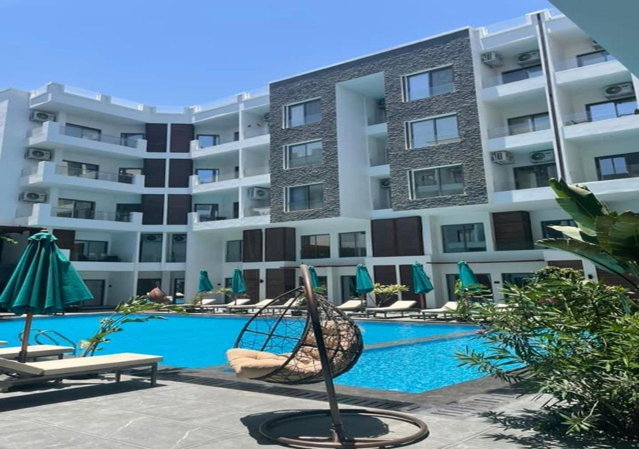 Sanctuary Sunlit Hurghada Haven With 4 Pools, Rooftop Sunsets & Gourmet Bites Steps Away מראה חיצוני תמונה