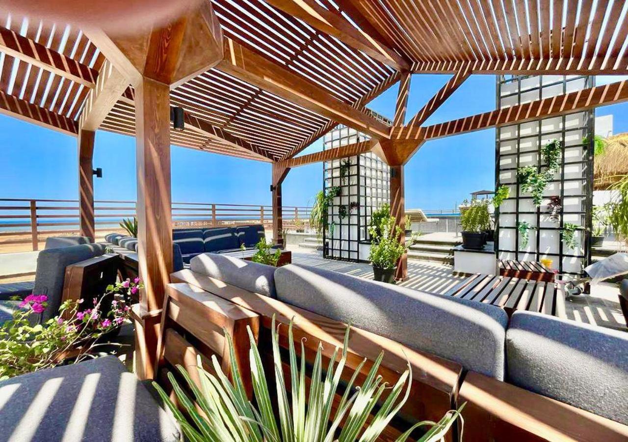 Sanctuary Sunlit Hurghada Haven With 4 Pools, Rooftop Sunsets & Gourmet Bites Steps Away מראה חיצוני תמונה