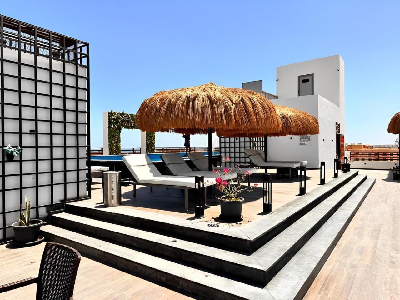 Sanctuary Sunlit Hurghada Haven With 4 Pools, Rooftop Sunsets & Gourmet Bites Steps Away מראה חיצוני תמונה
